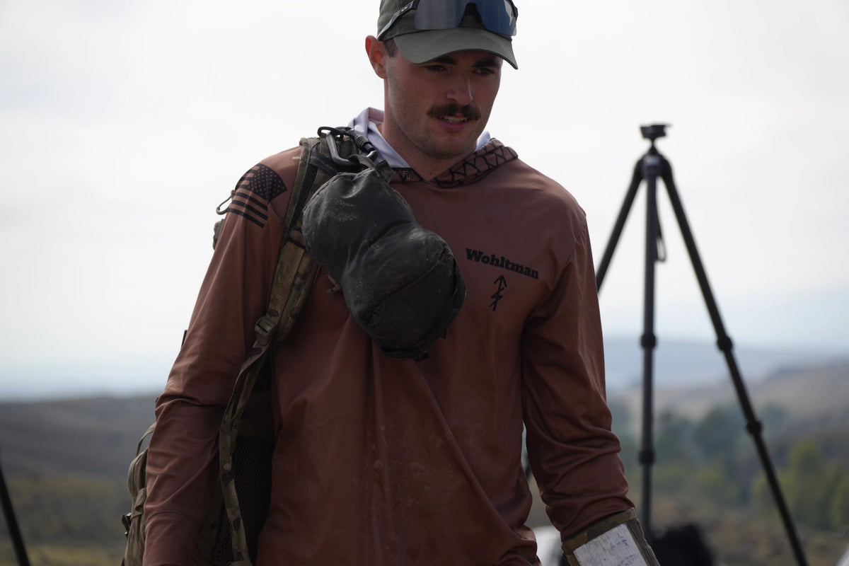 Bad Dope Society custom sun shirt, tan, personalized "Wohltman" name print worn at a PRS rifle match