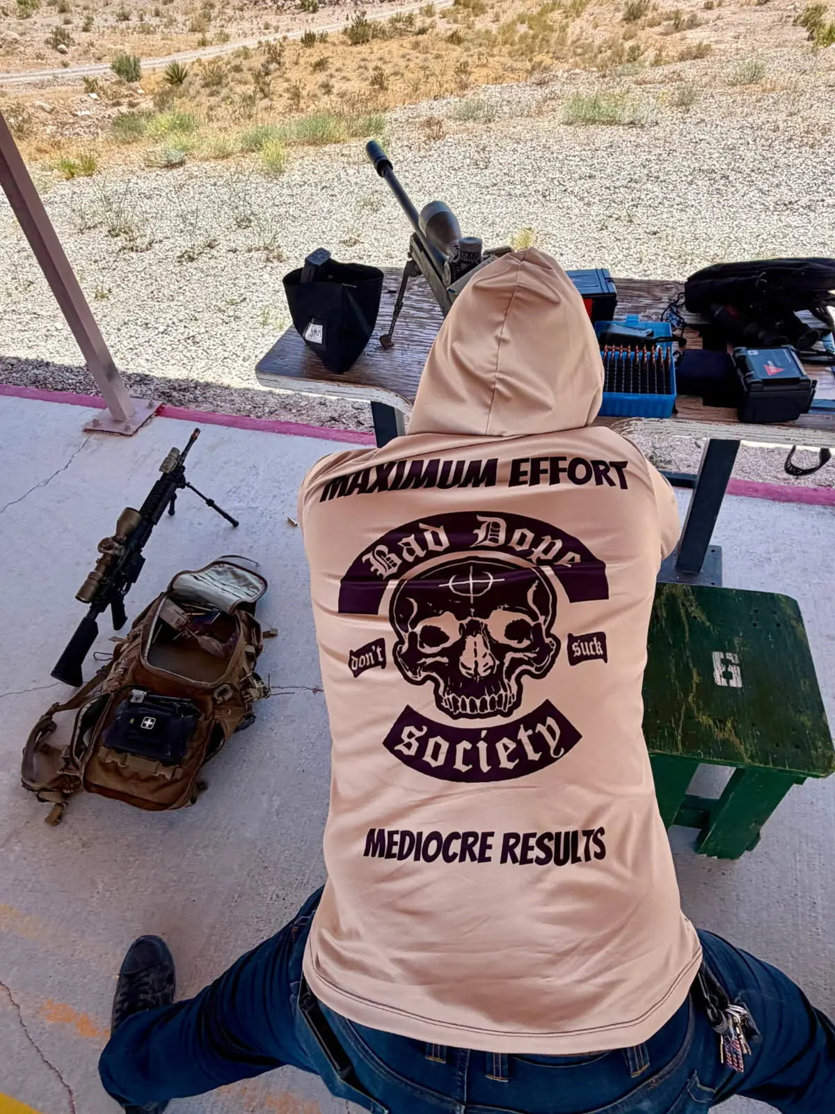Bad Dope Society Maximum Effort Sun Shirt (Sand), lifestyle, kneeling at a desert shooting range bay