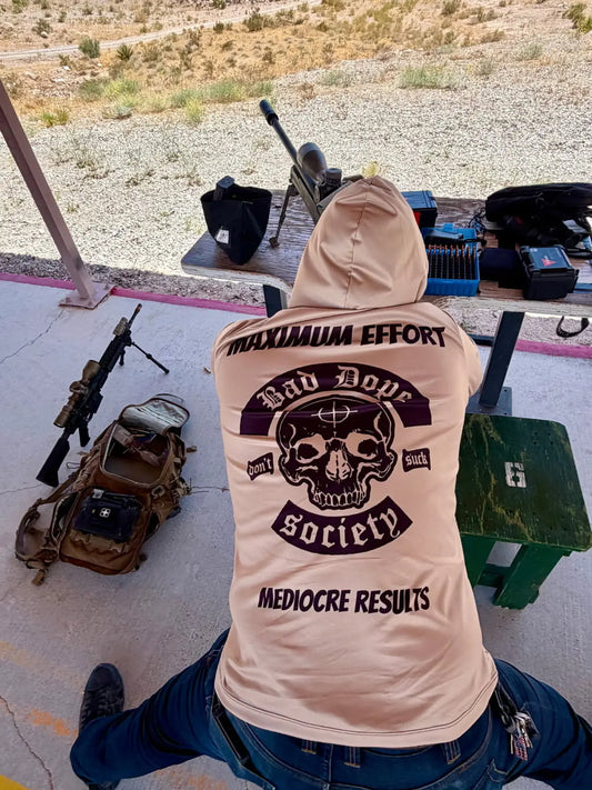 Bad Dope Society Maximum Effort Sun Shirt (Sand), lifestyle, kneeling at a desert shooting range bay